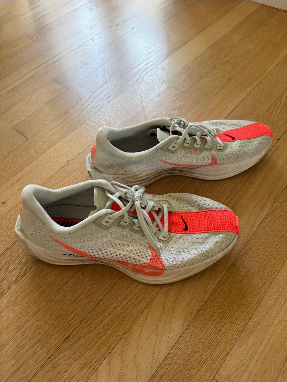 Nike Women’s Athletic Shoes - White with Neon Coral Stripe